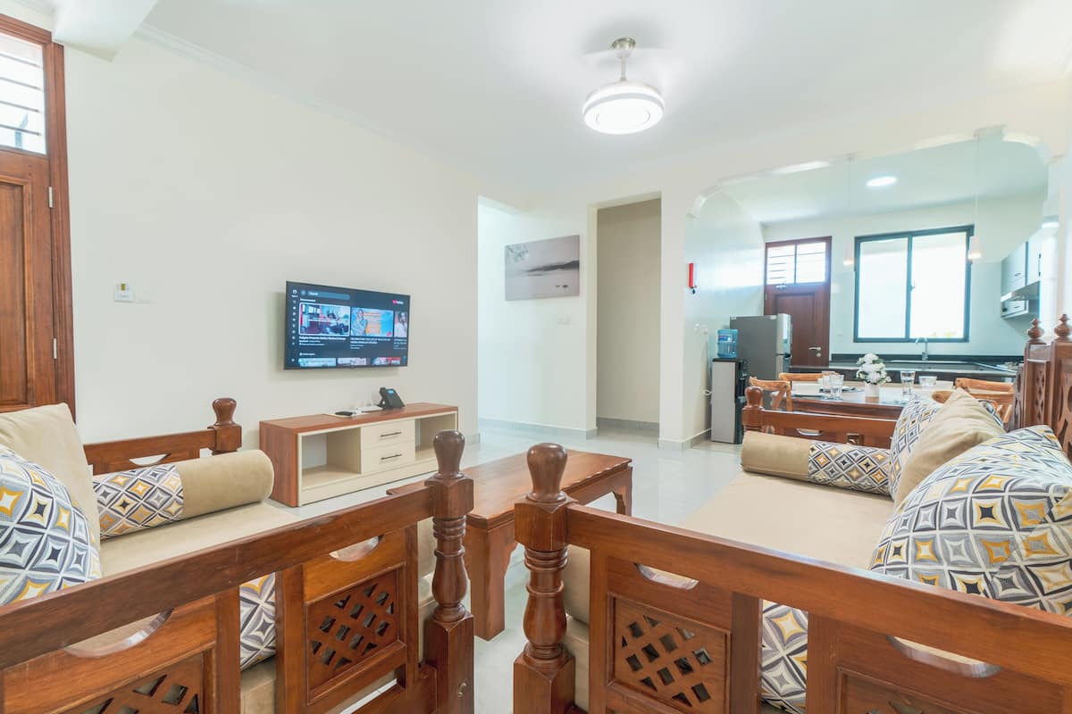 Deluxe Villa, 2 Bedrooms, Pool View | Living area | 32-inch Smart TV with digital channels, Netflix, streaming services