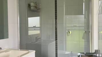 Shower, towels, soap, toilet paper