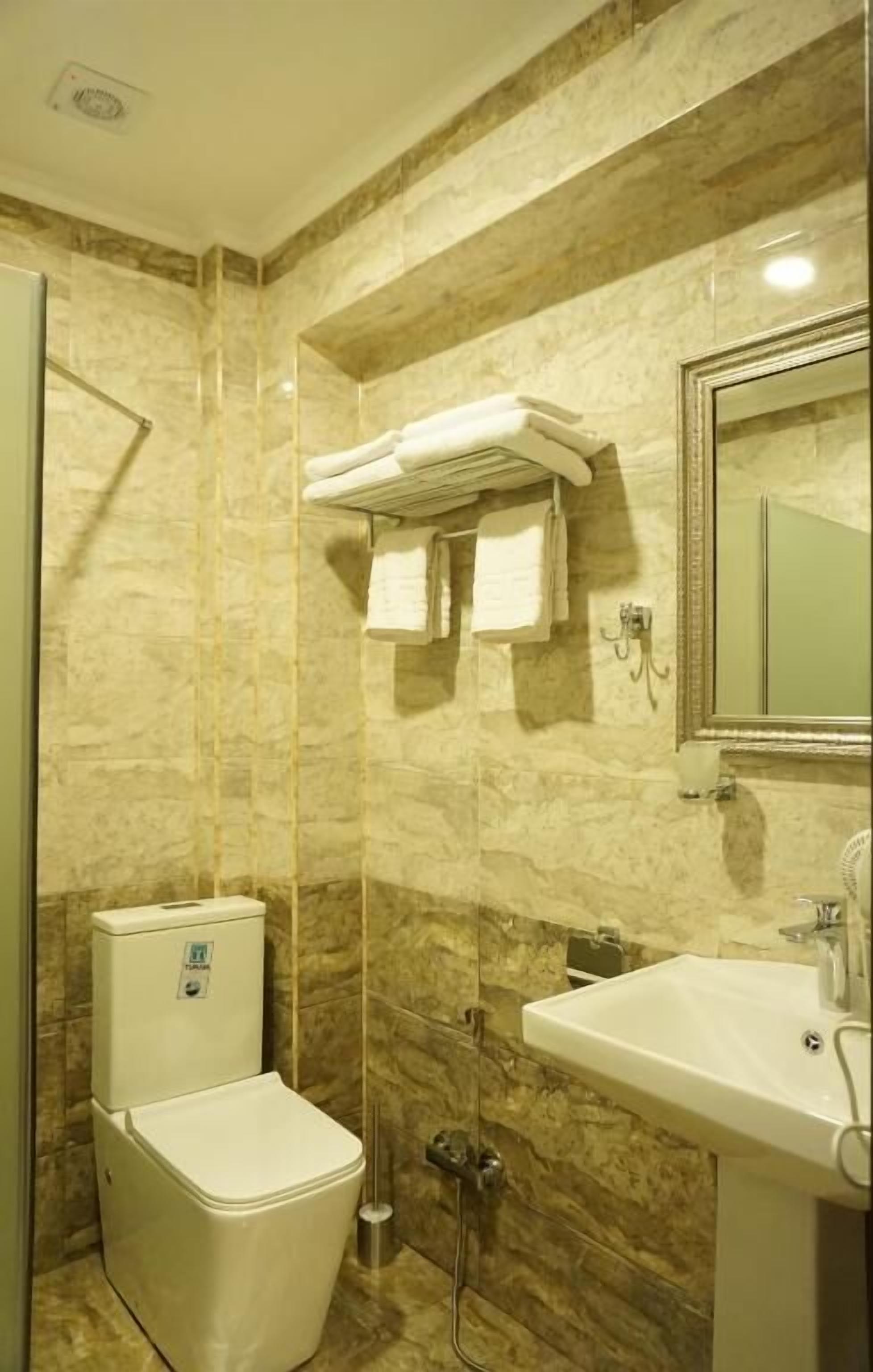 Standard Double Room, City View | Bathroom | Free toiletries, slippers, towels, shampoo