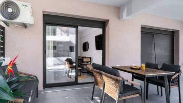 Deluxe Apartment, 1 Bedroom, Poolside | Terrace/patio