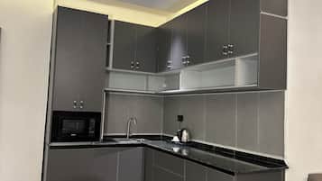 Appartement Luxe, 2 grands lits, coin cuisine | Cuisine privée