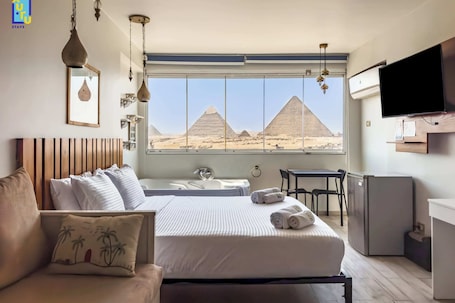 9 habitaciones, tabla de planchar con plancha y ropa de cama