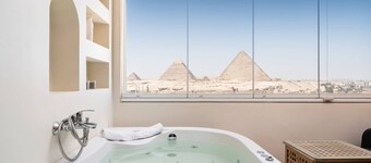 Xuru Stays I Jacuzzi Studios @ The Pyramids