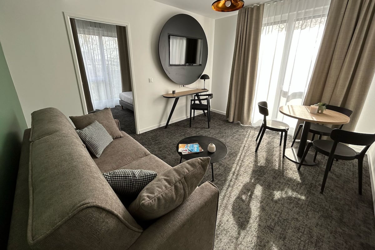 Appartement (T2/4 pers) | Coin séjour | TV connectée