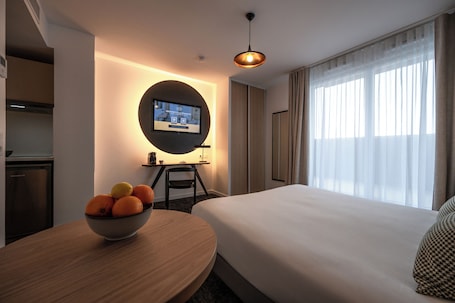 Standard Studio | Living area | Smart TV. Nemea Appart Hotel Bordeaux Pessac