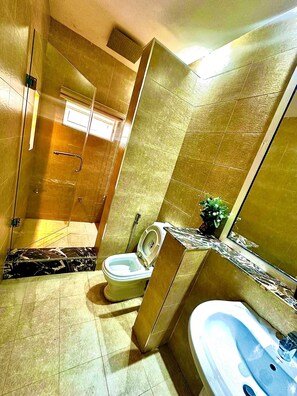 Studio Suite | Bathroom | Slippers - kamzigi luxury apartment (Abuja)