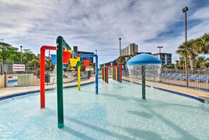 A water play area with colorful structures and a blue dome. - Myrtle Beach Resort 2BD Condo w/ Lazy River (Myrtle Beach)