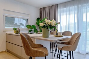 Fridge, microwave, highchair, cookware/dishes/utensils