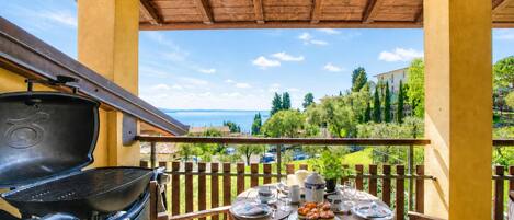 Standard Apartment, 1 Bedroom, Balcony, Mountainside (Alice Suite Terrace, lake view & Park) | Outdoor dining