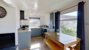 Fridge, microwave, oven, dining tables