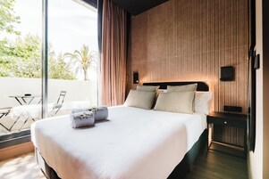 Enkeltværelse - balkon | Pengeskab på værelset, arbejdsområde til bærbare computere