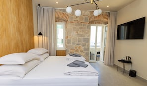 Deluxe Double Room, Balcony, Partial Sea View | Egyptian cotton sheets, premium bedding, Select Comfort beds, minibar - East Coast Deluxe Rooms (Split)