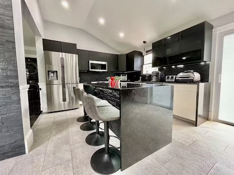 Fridge, microwave, oven, stovetop. Modern Luxurious Home 5-bed