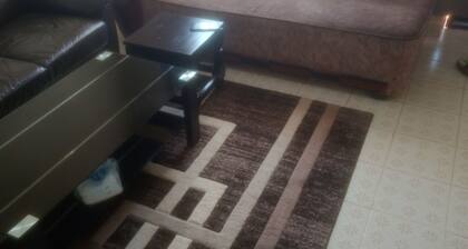 Welcome to Cozy 1-bedroom retreat with WiFi in the heart of charming Meru