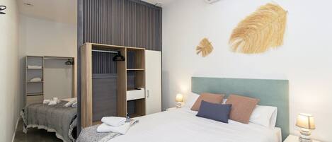 1 slaapkamer, een strijkplank/strijkijzer, internet, beddengoed