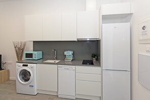 Fridge, microwave, dishwasher, coffee/tea maker