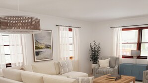 Un salon moderne avec un canapé beige, une table basse en bois et un fauteuil à rayures. Un tableau est accroché au mur, il y a une plante en pot et une fenêtre avec des rideaux.