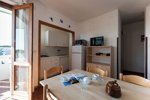Apartment, 2 Bedrooms, Balcony | Dining room