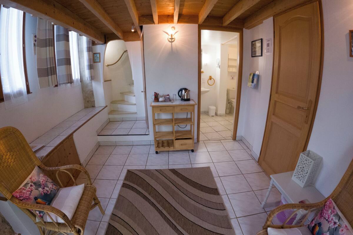Habitación Deluxe con 1 cama matrimonial o 2 individuales | Área de sala de estar