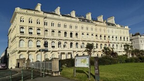 A large, historic building with multiple windows and a prominent entrance. - Martello By Pureserviced (Plymouth)