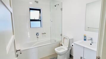 Hair dryer, towels, soap, toilet paper