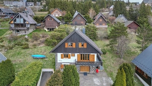 A residential area with multiple houses, each featuring a distinct architectural style.