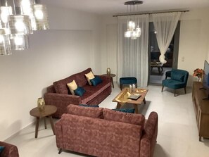 Appartement Supérieur, 2 chambres, vue piscine | Coin séjour