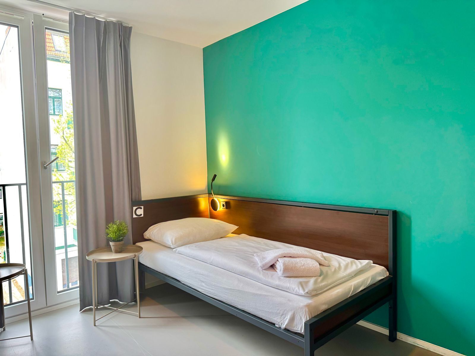 Classic Triple Room, Patio, Courtyard View | Premium bedding, soundproofing, free cribs/infant beds, travel crib