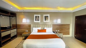 Suite Premium, pemandangan kota | Area keluarga | TV 43-inci dengan saluran TV kabel