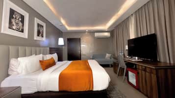 Suite prèmium, vistes a la ciutat | 1 dormitori, caixa forta a l'habitació, escriptori i cortines opaques