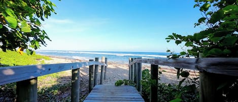 On the beach, sun loungers, beach towels