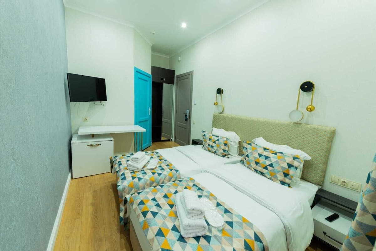 Double or Twin Room | In-room safe, desk, laptop workspace, blackout curtains