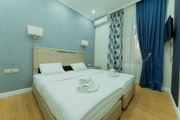 Doppel- oder Zweibettzimmer | Wohnbereich