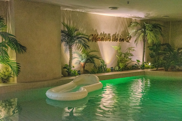 Suite Keluarga | Seprai premium, selimut bulu angsa, busa memori, dan minibar gratis