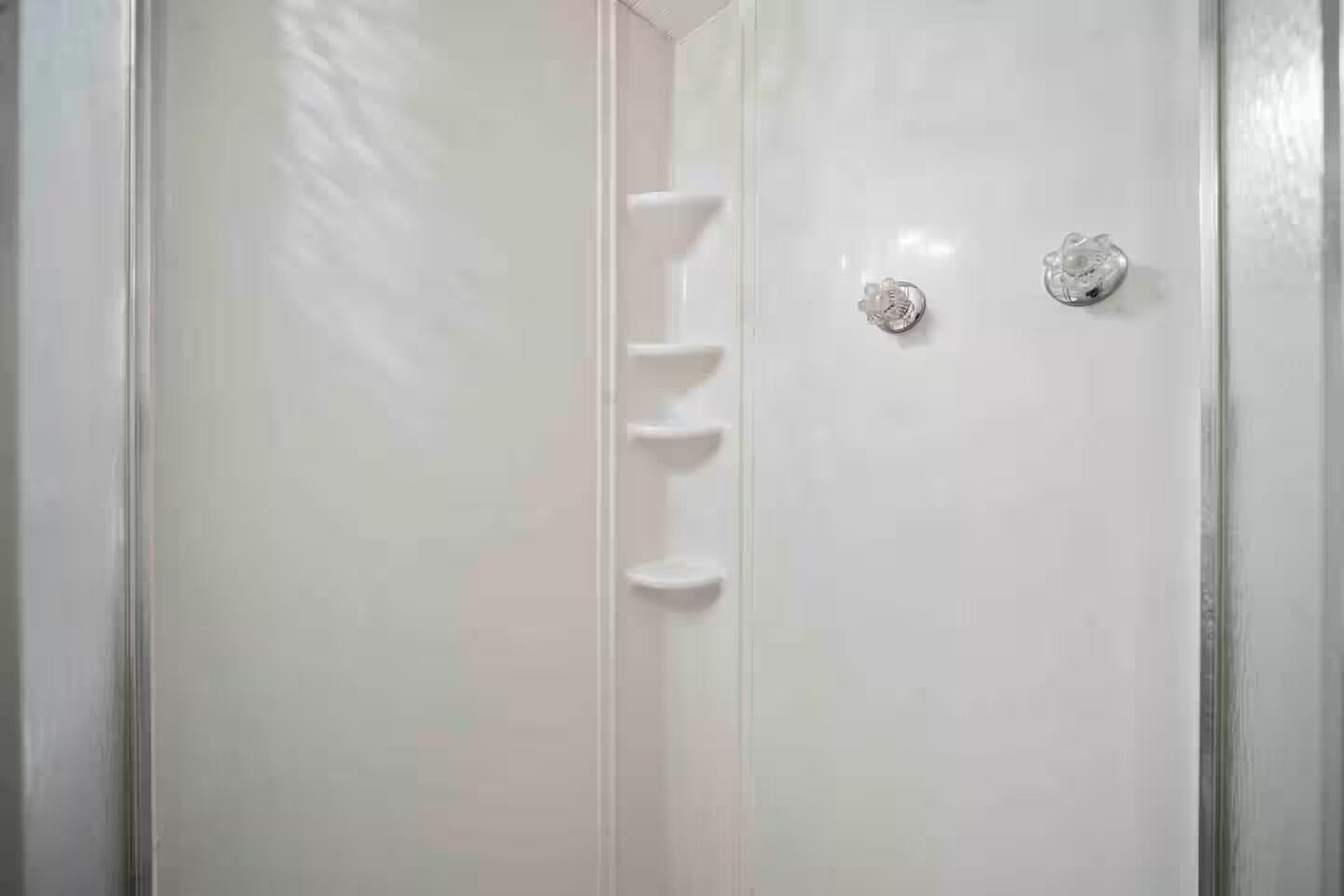 A white door with a handle and a keyhole.