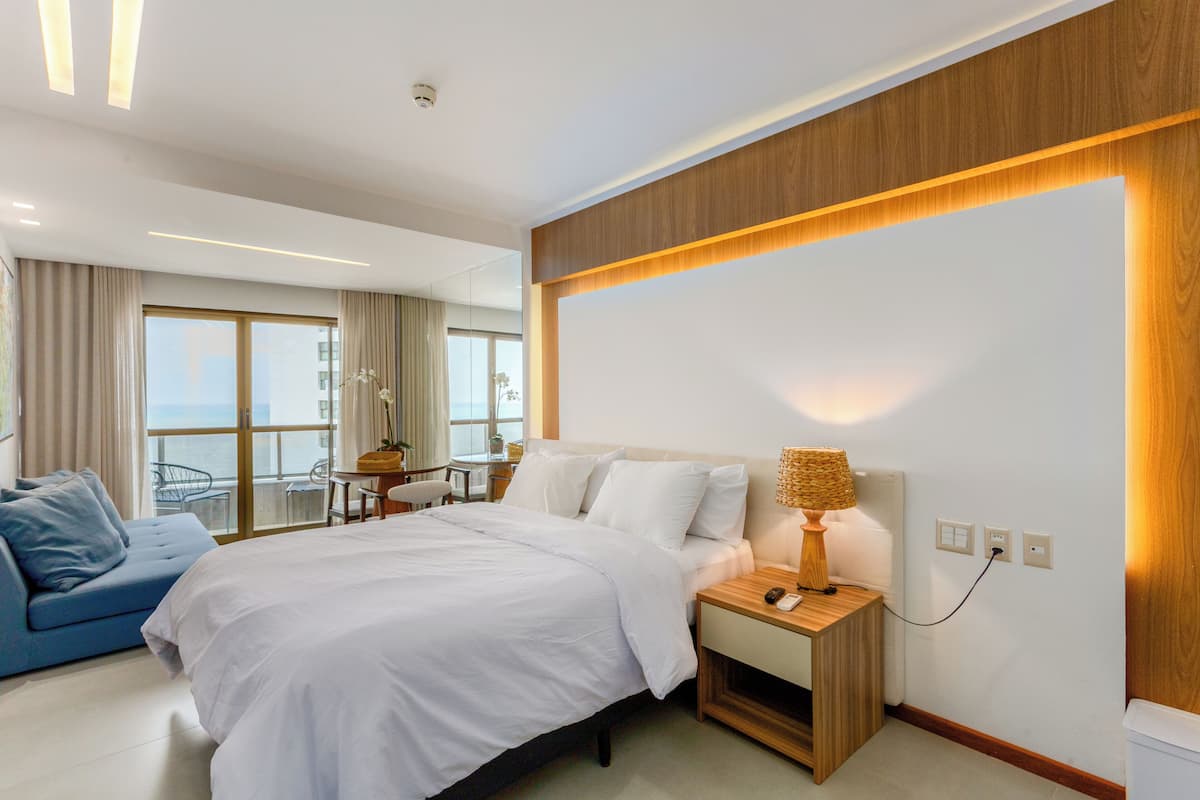 Deluxe Apartment, Balcony, Beach View | Living area | Smart TV