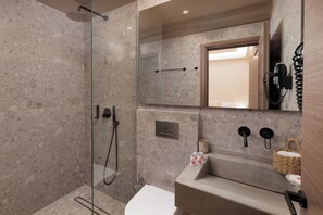 Shower, eco-friendly toiletries, hair dryer, towels