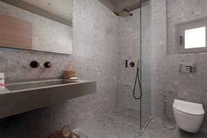 Shower, eco-friendly toiletries, hair dryer, towels