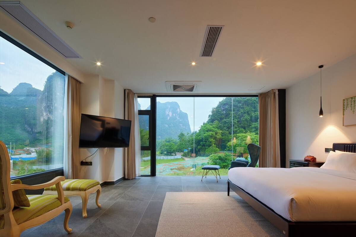 Deluxe Double Room, 1 King Bed, River View | 1 bedroom, desk, free WiFi