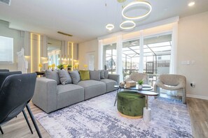 Superior Townhome | Living room - Fabulous 5Bd Pool & Game Room @ Windsor Cay 1253 (Clermont)