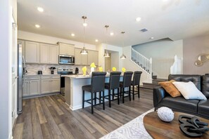 Superior Townhome | Private kitchen | Fridge, oven, stovetop, dishwasher