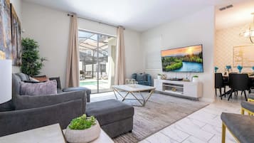 Superior Townhome | Living area | 50-inch Smart TV with cable channels, Netflix, Hulu