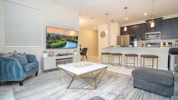 Superior Townhome | Living area | 50-inch Smart TV with cable channels, Netflix, Hulu