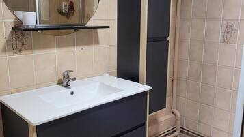 Shower, hair dryer, soap, shampoo