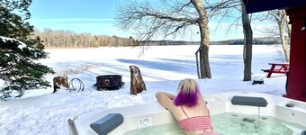 Salt water hot tub, king size beds, dog friendly, lake front, dock, boat launch