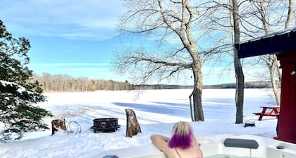 Salt water hot tub, king size beds, dog friendly, lake front, dock, boat launch