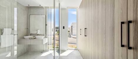 A modern bathroom with a glass shower enclosure, a large mirror, and a wooden wardrobe.