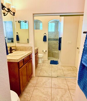 Shower, hair dryer, towels, soap