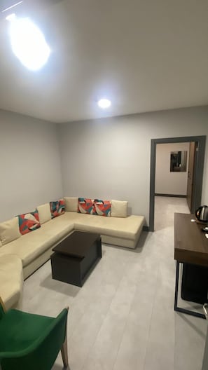 Standard Triple Room, City View | 1 bedroom, desk, free WiFi, bed sheets