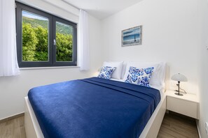 2 dormitorios, tabla de planchar con plancha, Internet y ropa de cama